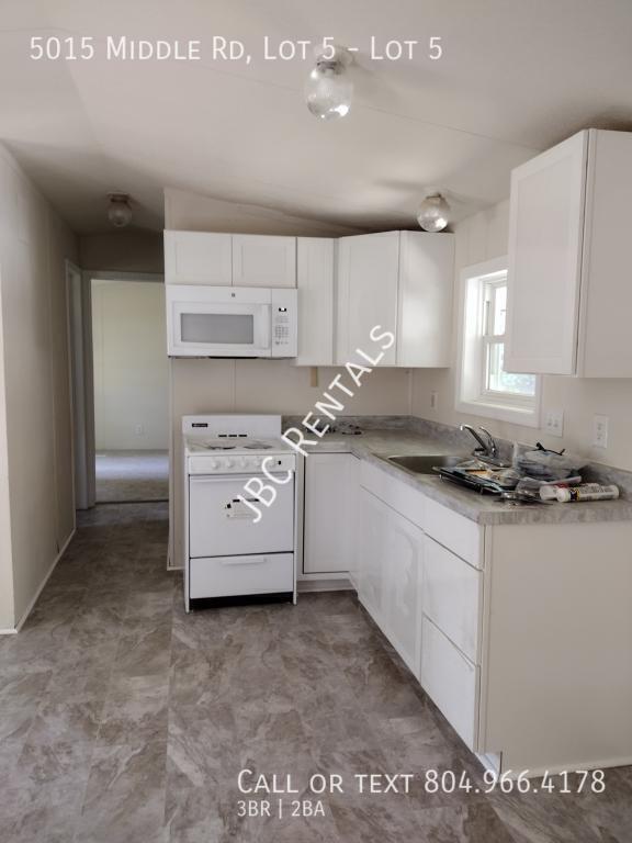 Photo - 5015 Middle Rd Unidad Lot 5