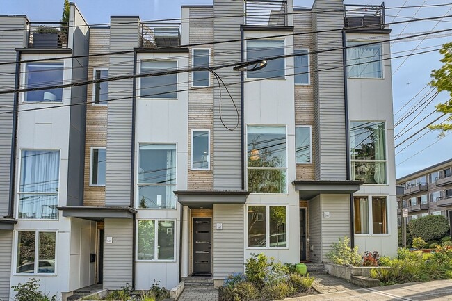 Building Photo - Modern stylings and cutting-edge convenien... Rental