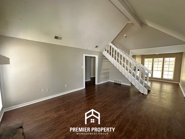 Photo - Beautiful 3BR/2BA Near Southwind | Soaring Vaulted Ceilings, Fireplace & Fenced Yard