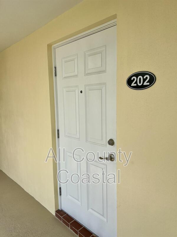 Photo - 23 Colonial Club Dr Unit 202