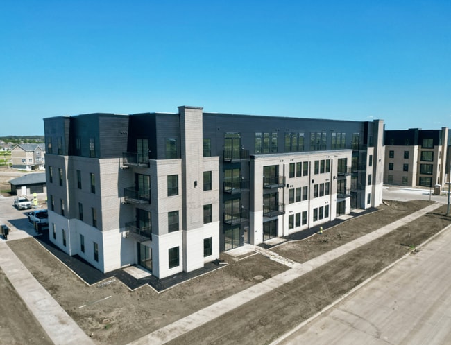 Building Photo - BRAND NEW! Top Floor 2-Bed Corner Private Balcony Unit 301