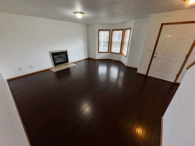 Photo - Spacious 4BR Home with Fenced Yard, 2-Car Garage & Convenient Location