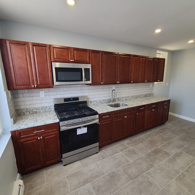 Building Photo - 6117 Monitor Plz Unit 2