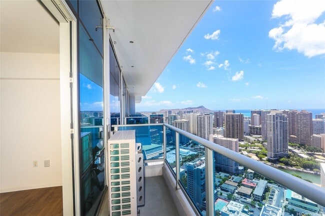 Photo - Priced Low to Sell!! Top floor with floor to ceiling windows to enhance the spectacular ocean