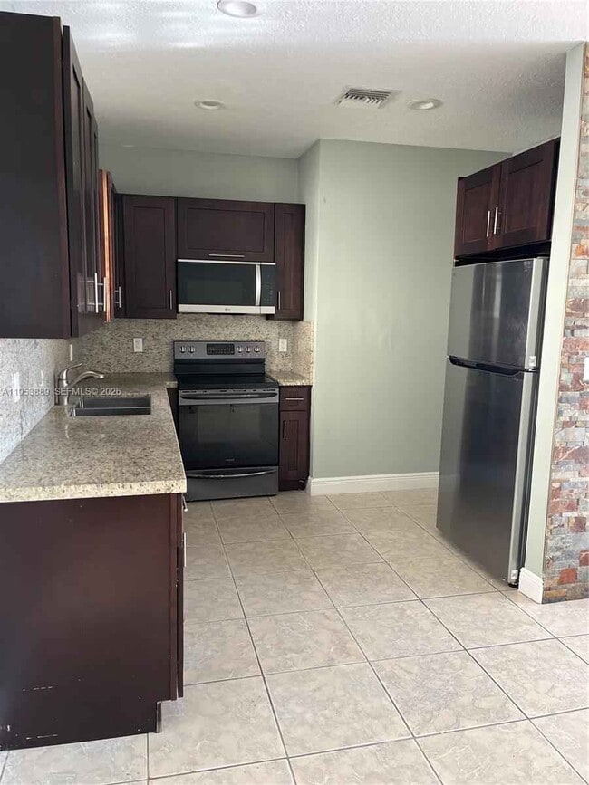 Photo - 601 NW 97th St