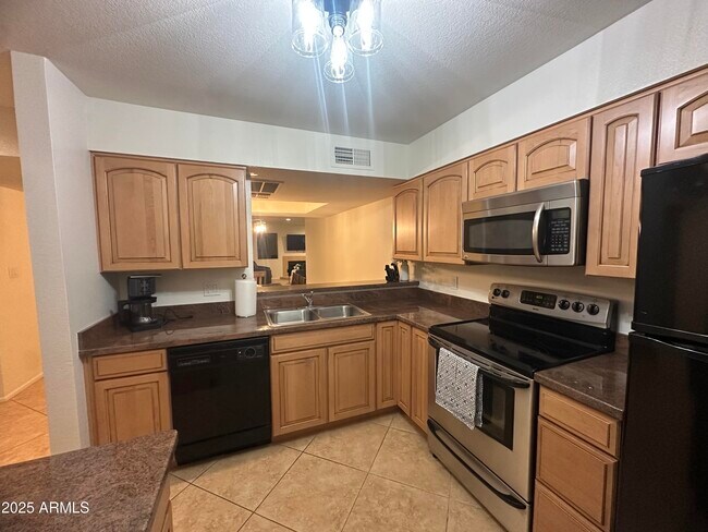 Photo - 9355 N 91st St Apartamento Unidad 228