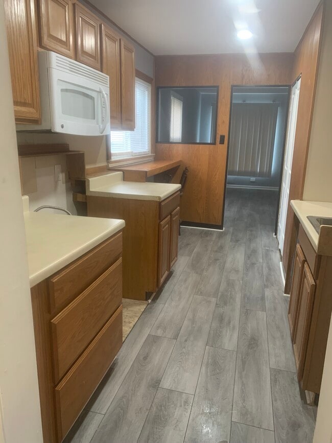 Kitchen with appliances - 11055 Chapp Ave