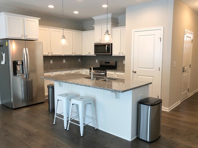 Photo - 3 Bed 2.5 Bath End Unit with Fenced in Backyard at Winsford At the Park!