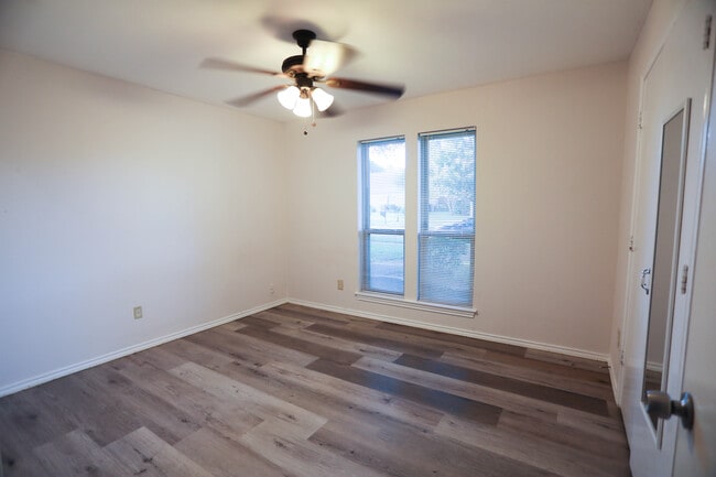 Photo - 1504 Flintwood Dr Unit Front Bedroom