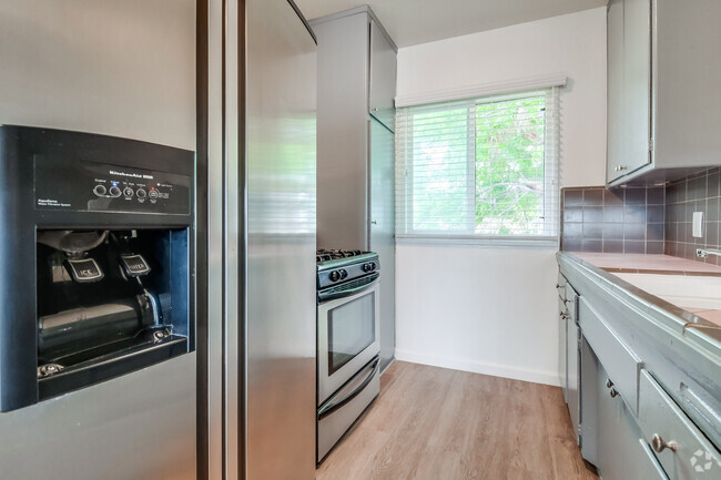 Building Photo - 6320 11th Ave Unit 10 Rental