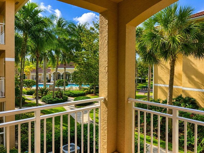 Building Photo - 6521 Emerald Dunes Dr Unit 206