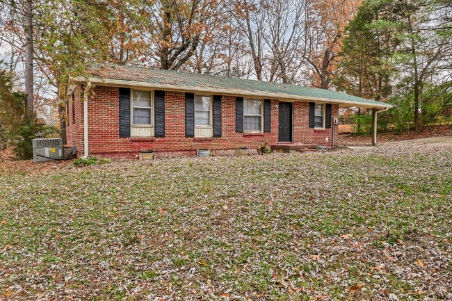 Photo - Cozy 3BR Home with Spacious Yard & XL Carport!
