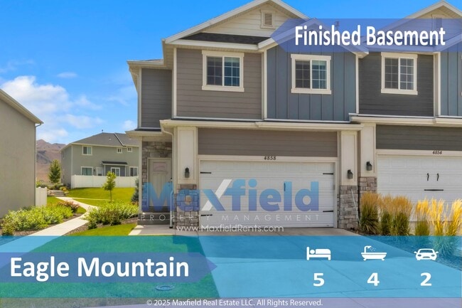 Building Photo - Spacious 5-Bedroom End-Unit Townhome with ...