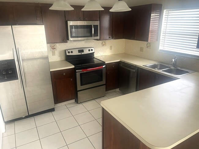 Building Photo - 5924 Longbow Ln Unit 7