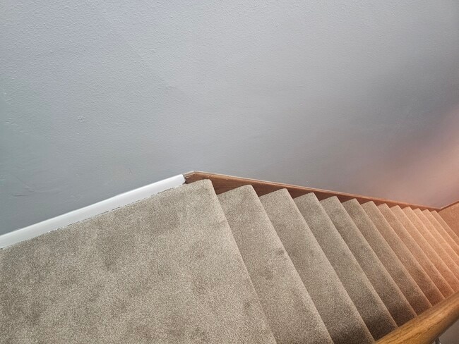 Stairs to upper level - 1112 13th St S Unit 1112