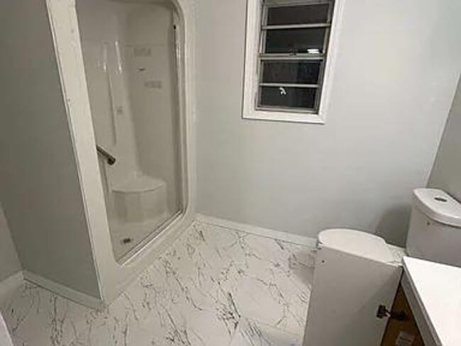 Photo - Renovated 3BR Home with Modern Floors & Fresh Interiors