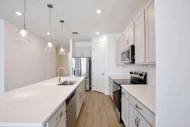 Photo - Stylish Sunbrooke Sanctuary! Modern 4/2 Home with High Ceilings, Designer Kitchen & Resort Amenities