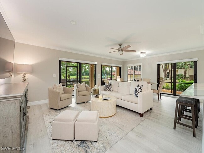 Building Photo - 6080 Pelican Bay Blvd Unit 104A Rental