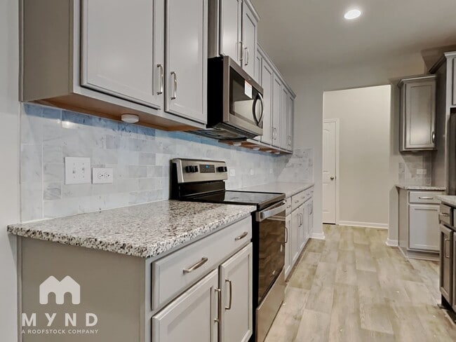 Building Photo - 8645 River Ridge Dr