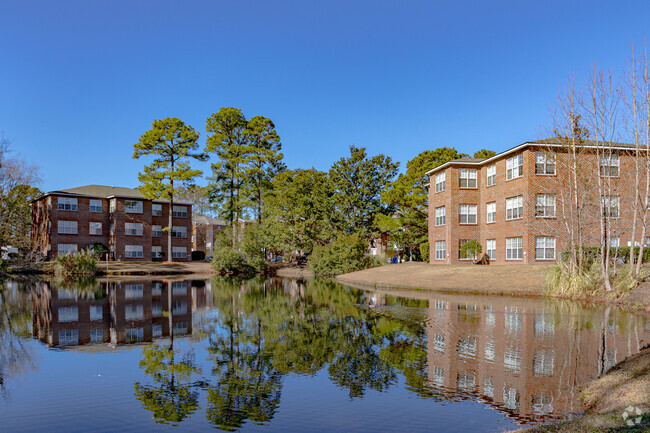 Pond view. - Club Villas at Baytree Apartments