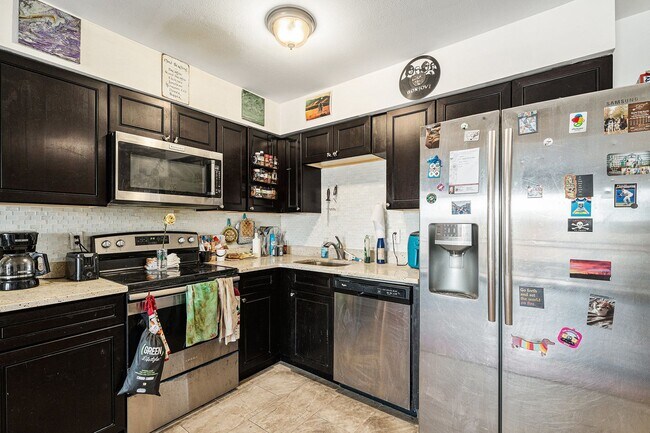 Photo - Top-Floor Condo with Trail Access + Community Perks! Unit J24