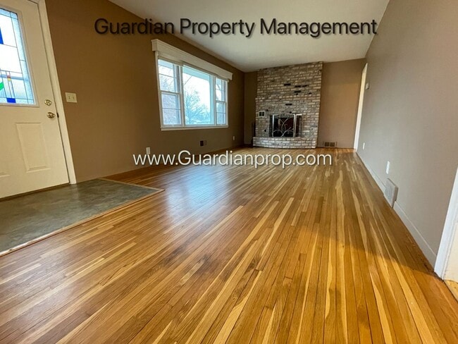 Photo - Single Family Home Featuring 2 Baths, 2 Car Garage, Fireplace, and Fenced in Yard