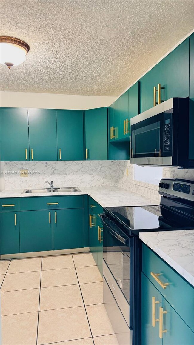 Photo - 1480 W 46th St Unit 322