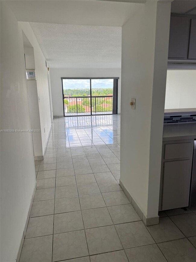 Building Photo - 10145 NW 9th St Cir Unit 7-502