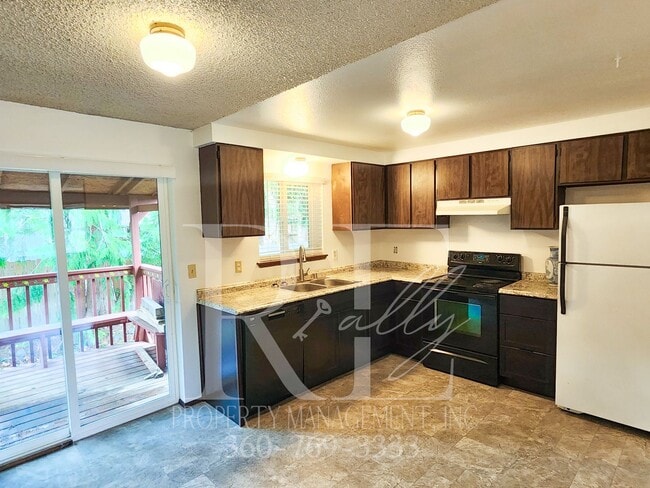 Photo - Spacious Living With Extra Comfort: Bonus Room & Expansive Yard