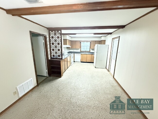 Photo - Welcome home to this charming 3-bedroom, 1.5-bathroom brick home featuring a spacious living and ...