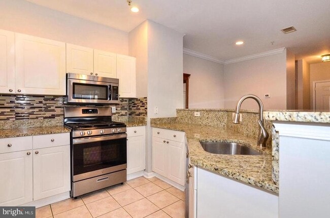 Building Photo - 11317 Aristotle Dr Unit 3-310