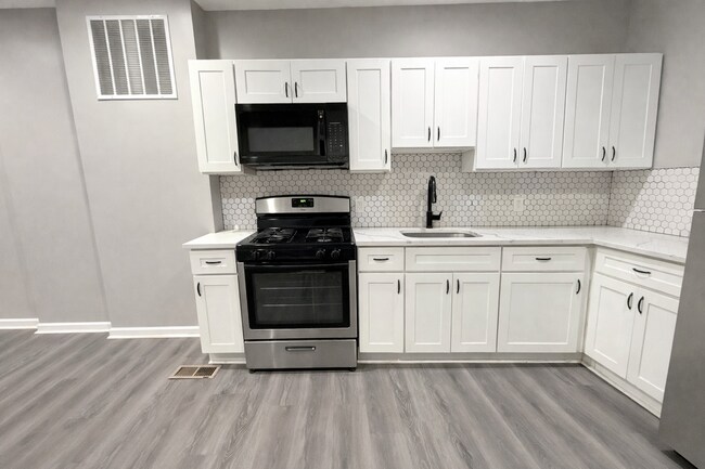 Photo - Beautiful 2BR + Den Home with 2 Baths, Modern Kitchen & Central AC