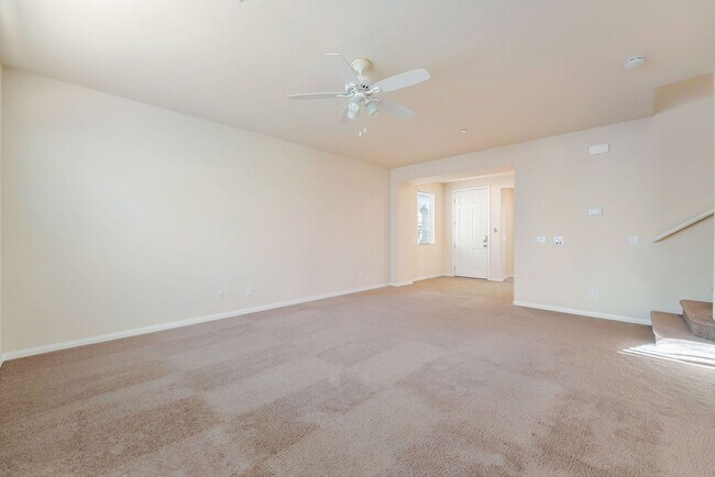 Photo - Stylish Two-Story Retreat with Designer Kitchen, Private Backyard & Flexible Living Space!