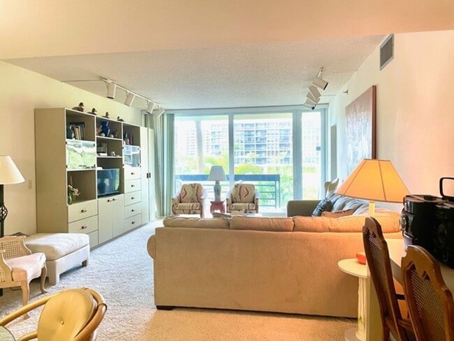 Photo - 2026 BEACH RENTAL- 2/2 Condo WITH PRIVATE ENTRY - BEACH PLACE - STEPS THE BEACH!! Unit 104