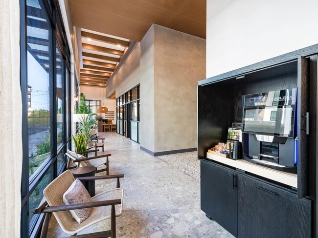 A thoughtfully designed coffee bar at Modera Higley Commons, offering a polished place to pause, recharge, and ease into the day.