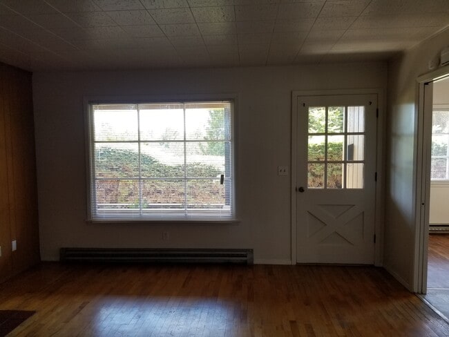 Photo - Occupied, do not disturb tenants. 2br duplex with carport and stackable washer/dryer included!