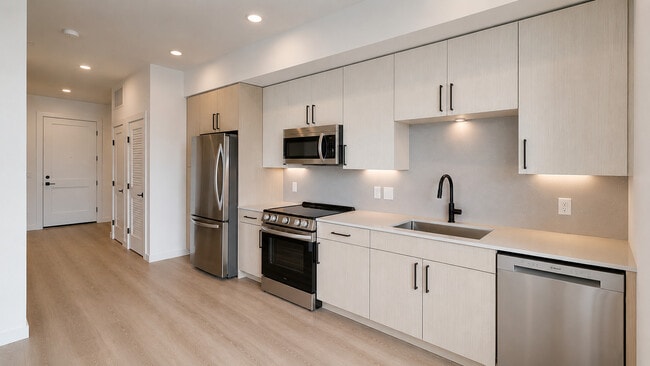 Bright minimalist kitchen and hallway