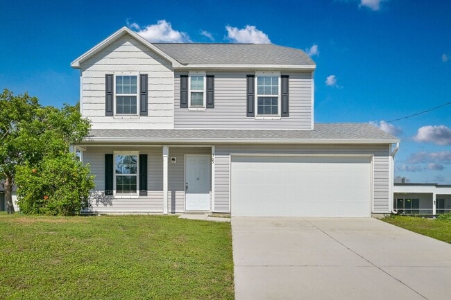 Building Photo - 3BR/2.5BA Cape Coral Home w/ 2-Car Garage & Spacious Yard – Available Now!