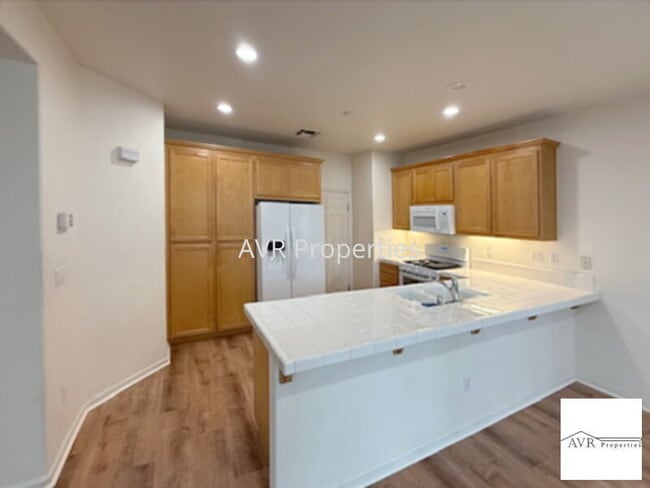 Photo - Spacious home with a large open concept kitchen, dining and living room