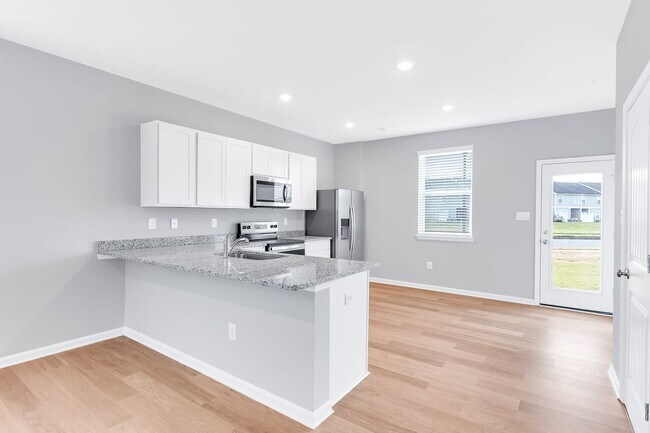 Photo - Stunning NEW Townhouse in Heritage Trace!