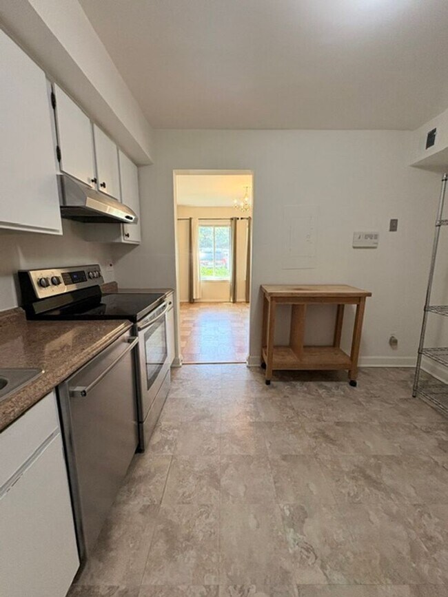 Photo - Large 2BR/1BA condo in gated community. Walking distance to Metro.