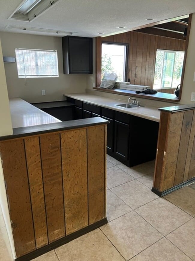 Photo - Spacious 4BR Cul-de-Sac Home with Large Backyard & Attached Garage