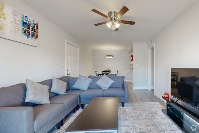 2BR, 1.5BA - 890SF - LIving Room - Spring Lake Cove Apartments