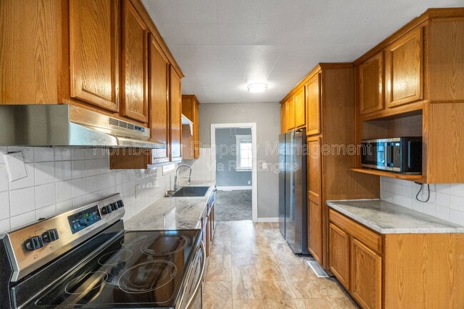 Building Photo - 410 E 8th Ave