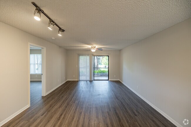 2BR, 2BA - 1,112SF - Orchid - Living Room/Dining Room - Oasis Naples Apartments