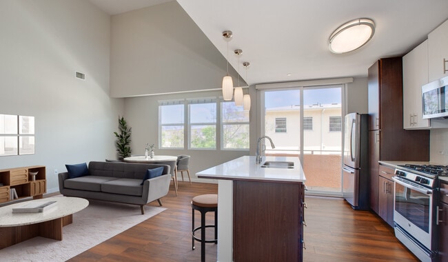 Limited edition floor plans feature stainless steel appliances, quartz countertops, and soft-close designer cabinets