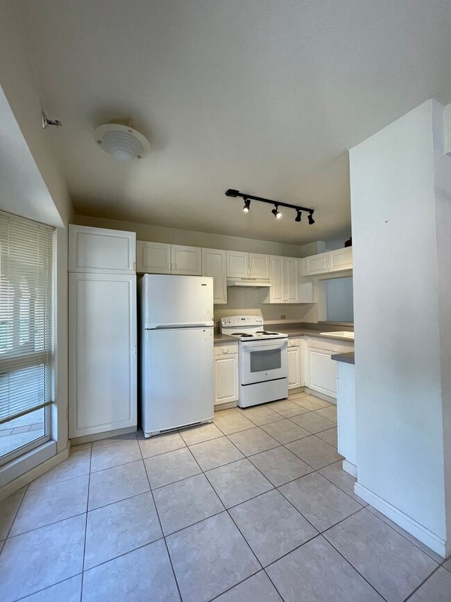 Photo - COUNTRY CLUB VILLAGE WITH 2 ASSIGNED PARKING Unit 313