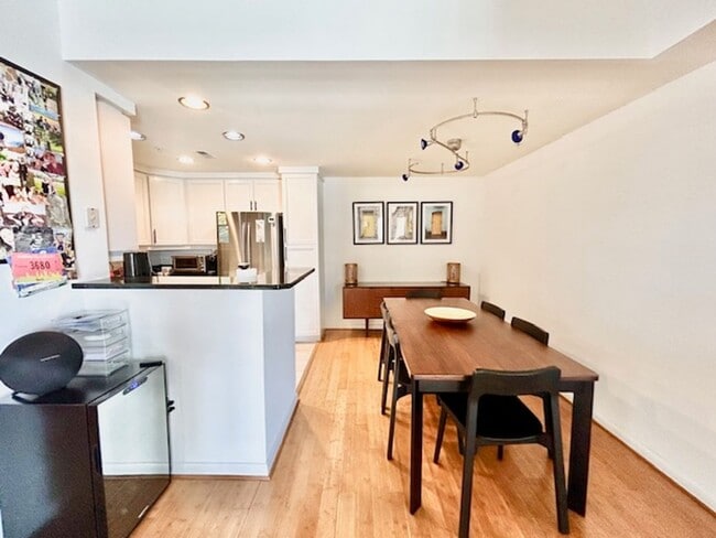 Photo - Welcome to this 2BD/2BA home at The Eleven with a BALCONY - GARAGE PARKING - 1 STORAGE UNIT! Unit 708