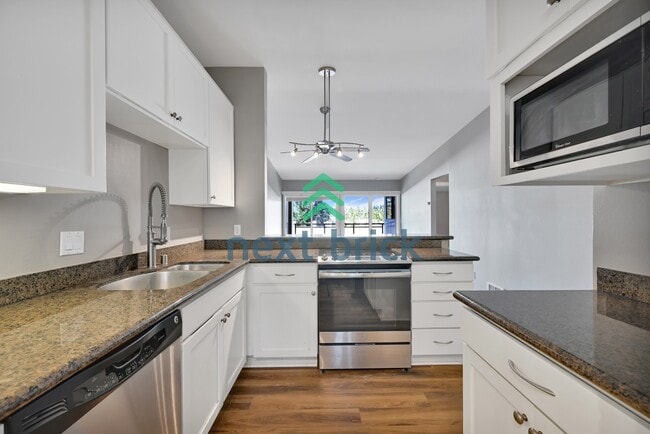 Photo - Downtown Bellevue Living | 2BR Condo with Storage & Balcony Unit Apt 308