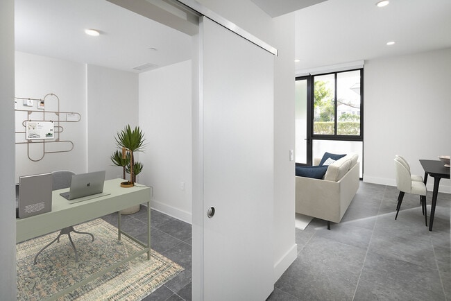 Signature Collection Townhome den with sliding barn door